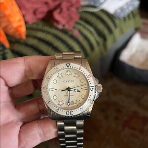 Gucci Silver Timepiece with White Dial